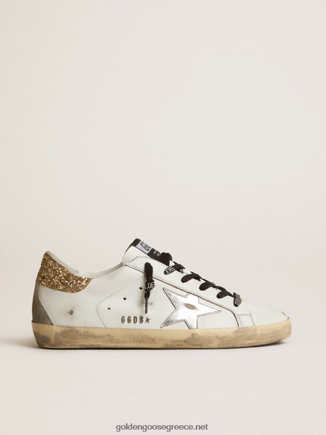 γυναίκες λευκά δερμάτινα sneakers super-star με αστραφτερή καρτέλα τακούνιGolden Goose 264N2R136
