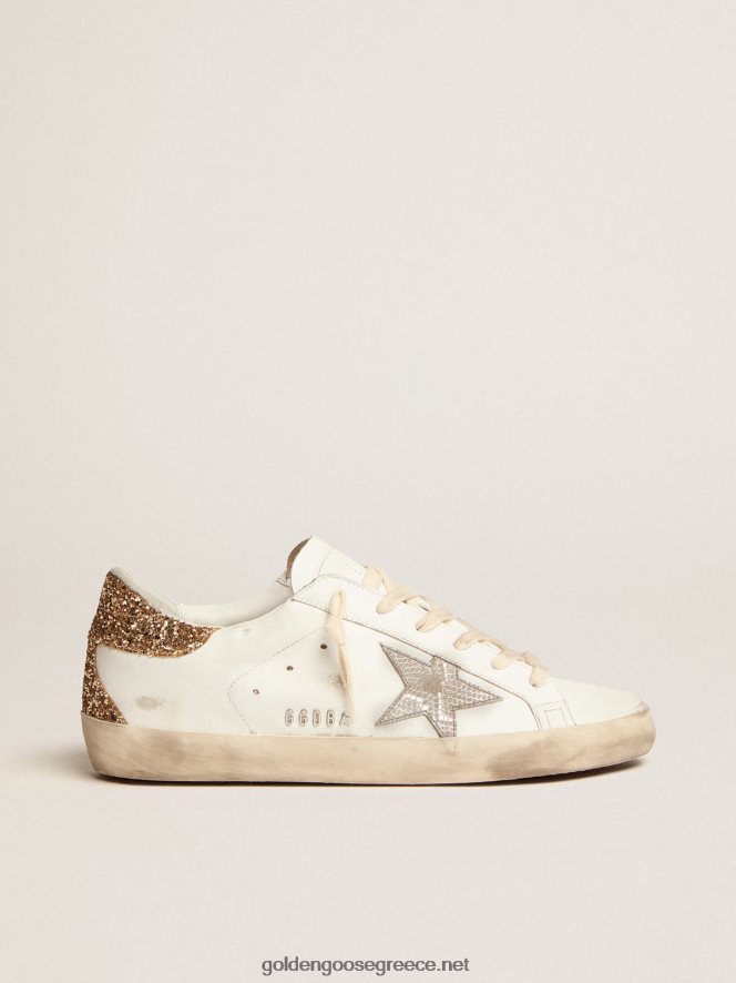 γυναίκες sneakers super-star με ασημί δερμάτινο αστέρι και χρυσό glitter τακούνιGolden Goose 264N2R6