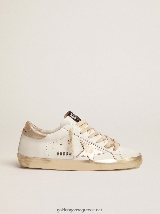 γυναίκες sneakers super-star με χρυσό sparkle foxing και μεταλλικά καρφιά γράμματαGolden Goose 264N2R60