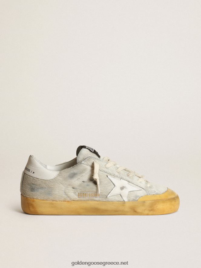 γυναίκες super-star sneakers penstar σε υπόλευκο δέρμα πόνι με λευκό δερμάτινο αστέρι και καρτέλα τακούνιGolden Goose 264N2R166
