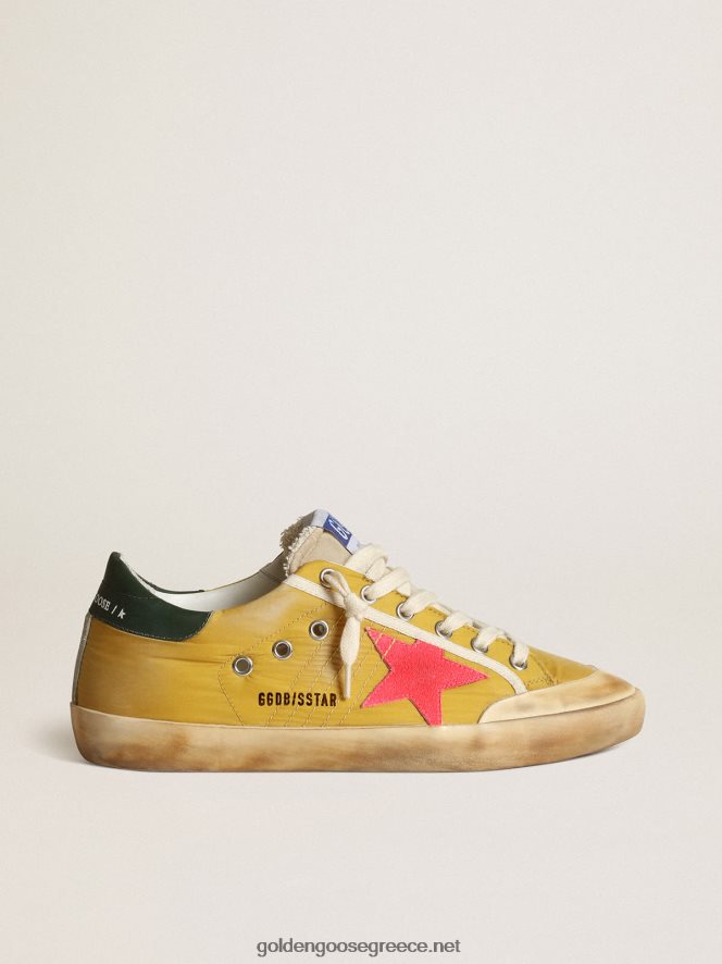 γυναίκες super-star sneakers penstar σε μουσταρδί νάιλον με φθορίζον αστέρι σουέτ σε χρώμα αστακούGolden Goose 264N2R31