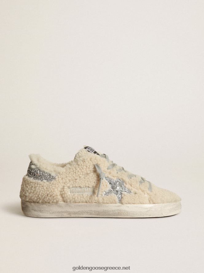 γυναίκες super-star sneakers σε μπεζ shearling με ασημένιο glitter αστέρι και καρτέλα τακούνιGolden Goose 264N2R246